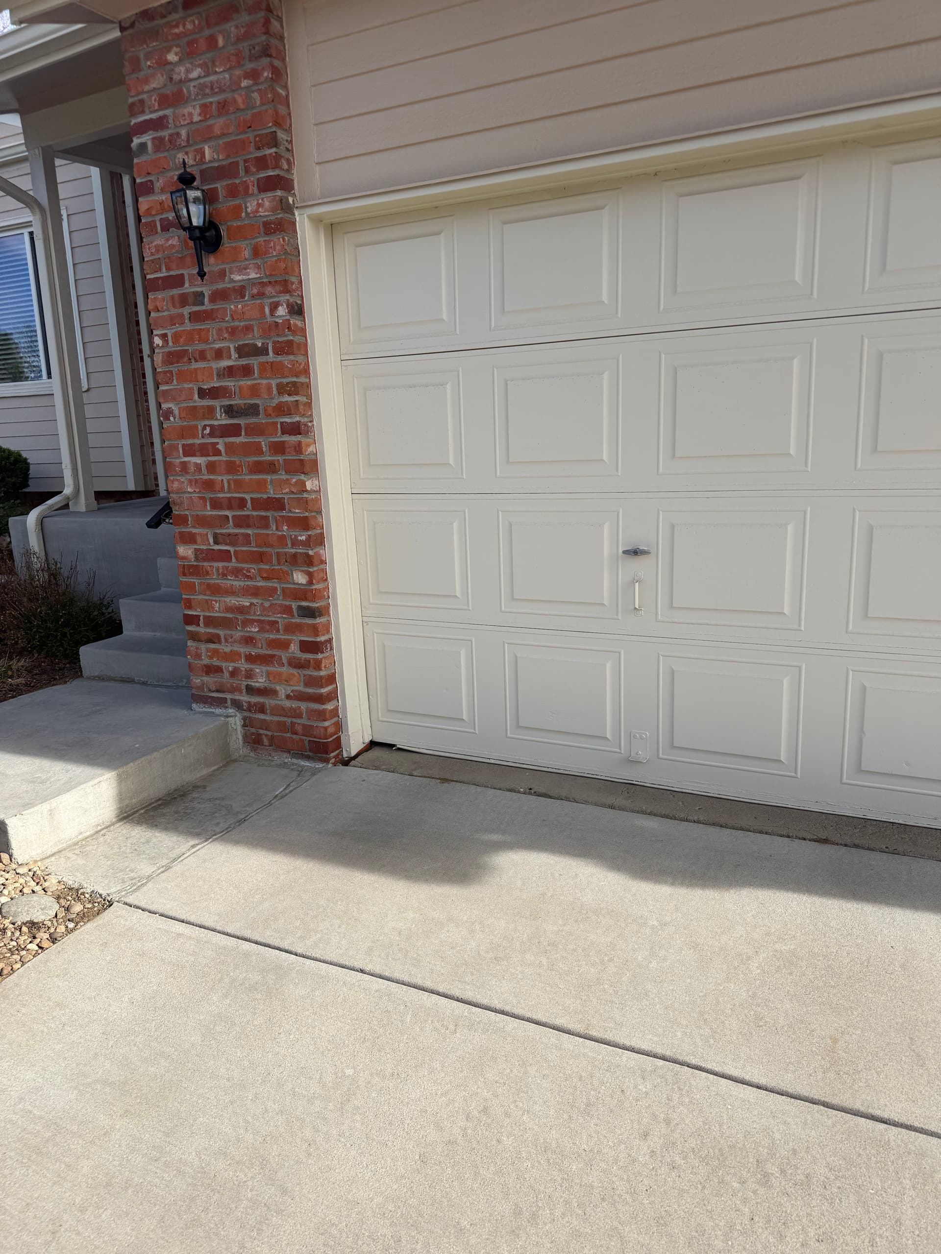 Old Garage Door Out, Fresh Installation Painted to Match image